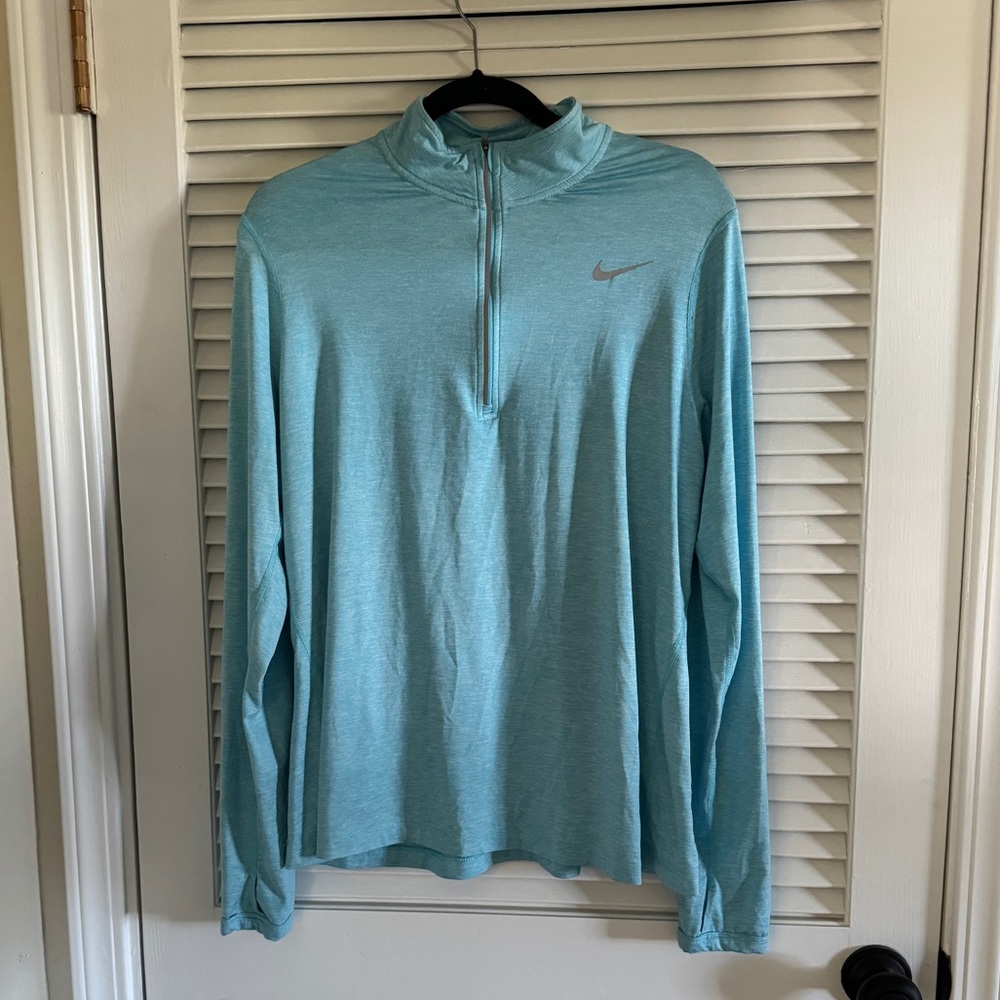 Women’s Nike quarter zip in light blue